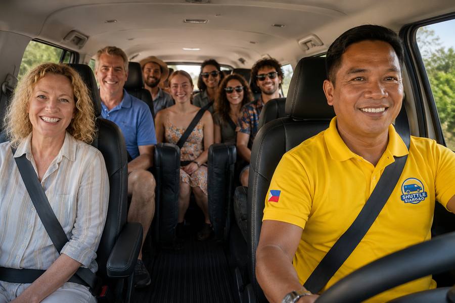 Passengers and driver smiling inside Shuttle Siargao air-conditioned van